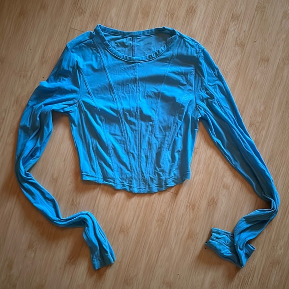 ALO Yoga Tops - Sheer blue corseted Alo crop long sleeve